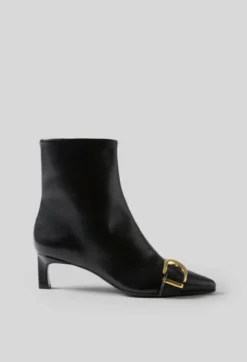 Bottines cuir boucle dorée