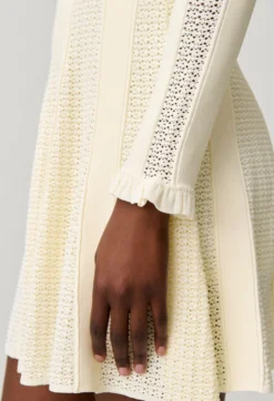 Robe courte maille patineuse