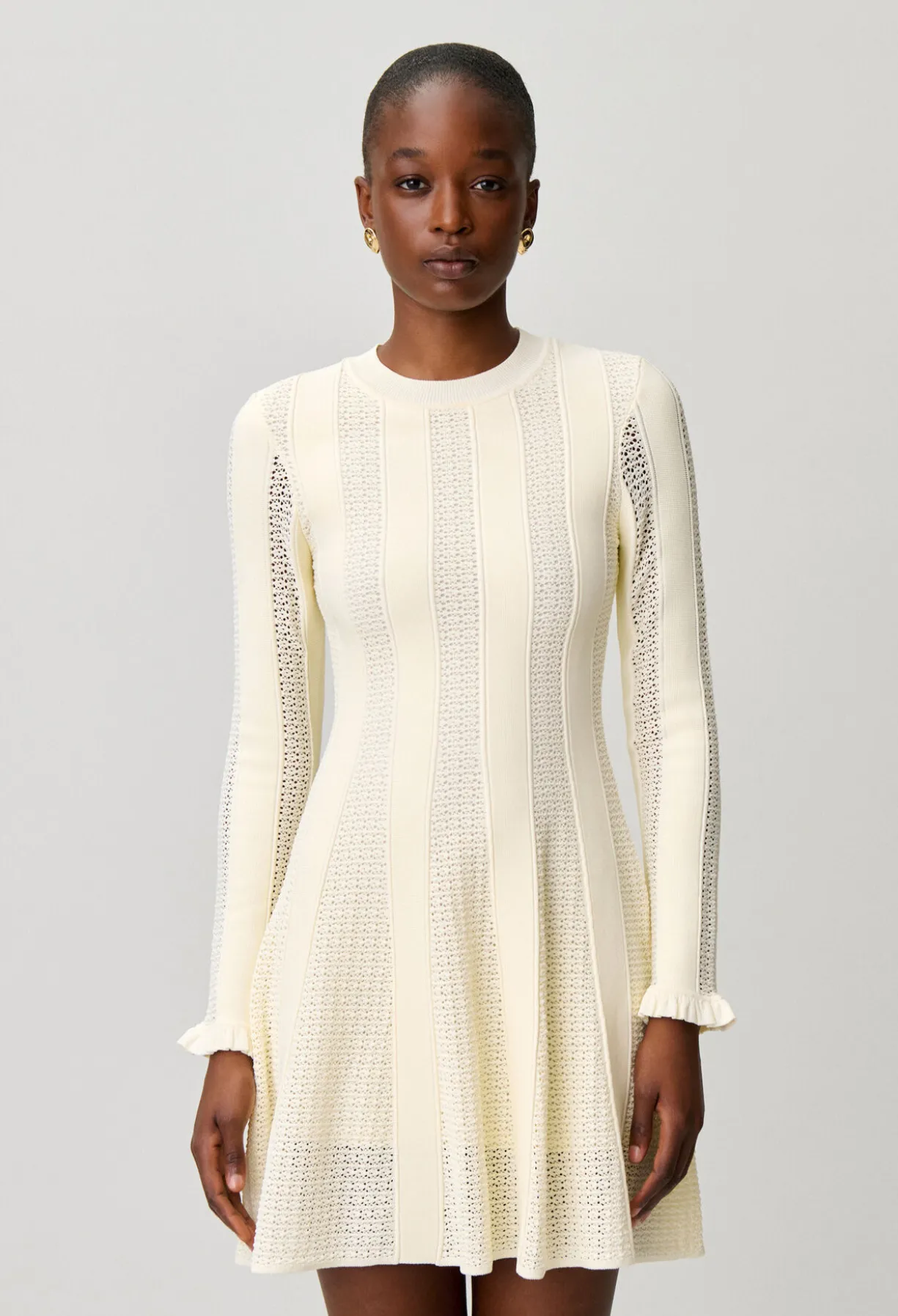 Robe courte maille patineuse